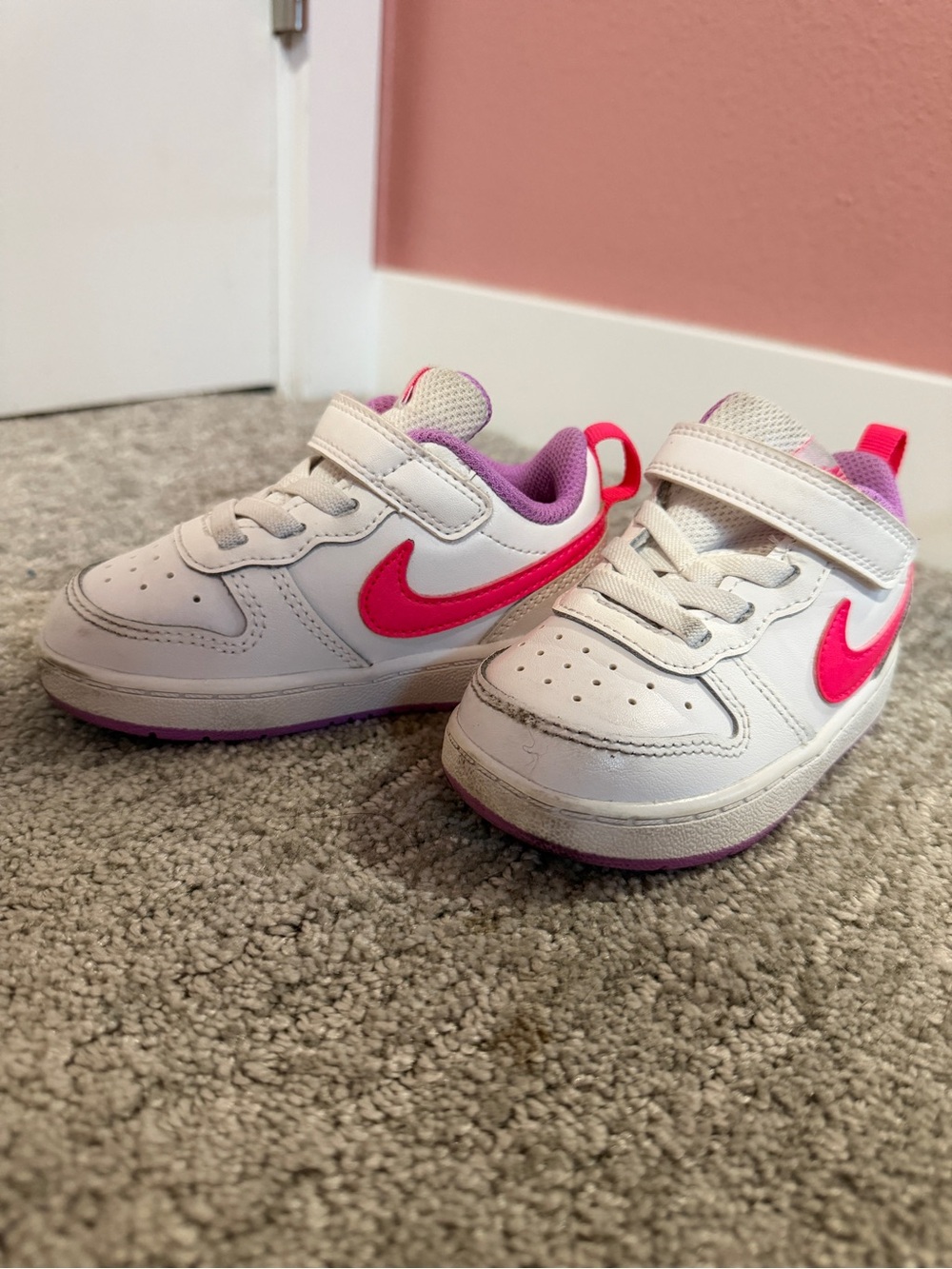 Nike Kids White Sneakers with Hot Pink Swoosh and Purple Lining